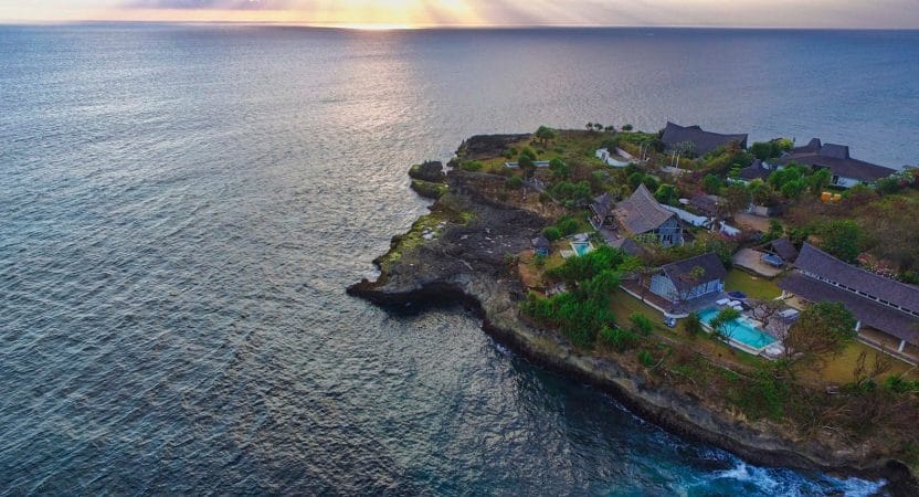 Aerial View of Villa Houses on Island Surrounded with Body of Water