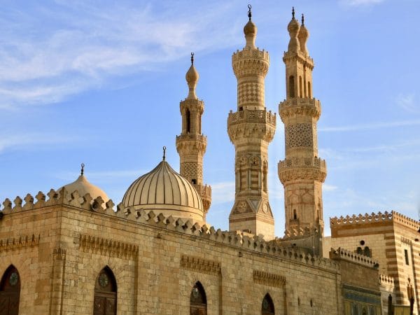 a large building with two towers and a dome